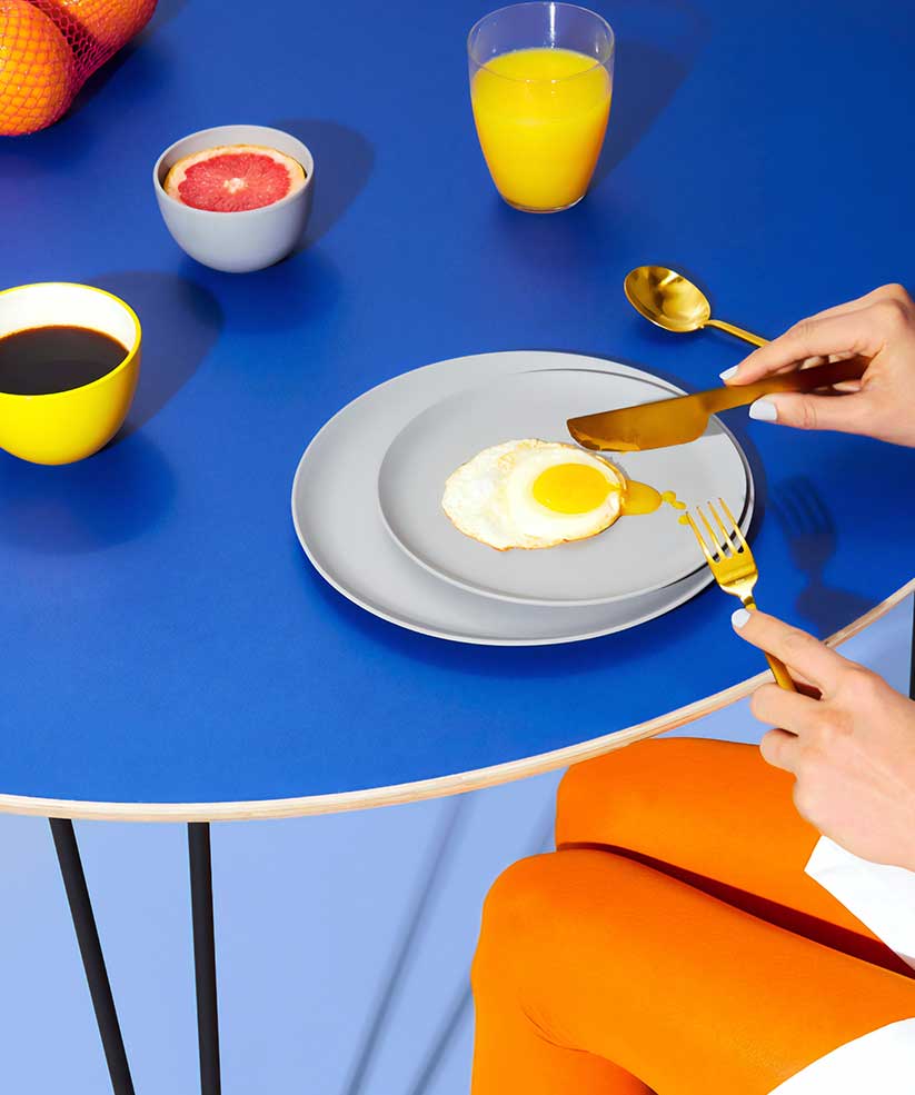 Person Eating with Juice and Coffee